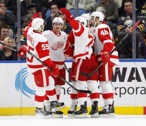Nov 23, 2016; Buffalo, NY, USA;Detroit Red Wings right wing Gustav Nyquist (14) celebrates with teammates after scoring a goal against the Buffalo Sabres during the second period at KeyBank Center. Mandatory Credit: Kevin Hoffman-USA TODAY Sports