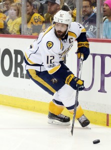 May 31, 2017; Pittsburgh, PA, USA;  Nashville Predators center Mike Fisher (12) skates with the puck against the Pittsburgh Penguins during the third period in game two of the 2017 Stanley Cup Final at PPG PAINTS Arena. Mandatory Credit: Charles LeClaire-USA TODAY Sports